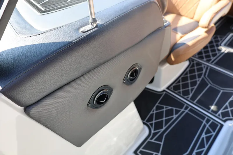 Slide: The Image of 2021 Tigé 21ZX boat interior with stylish seating and modern design elements. - 23