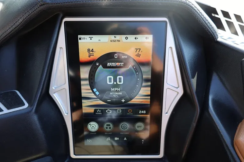 Slide: The Image of Touchscreen display in 2021 Tigé 21ZX boat showing speed and control settings. - 30