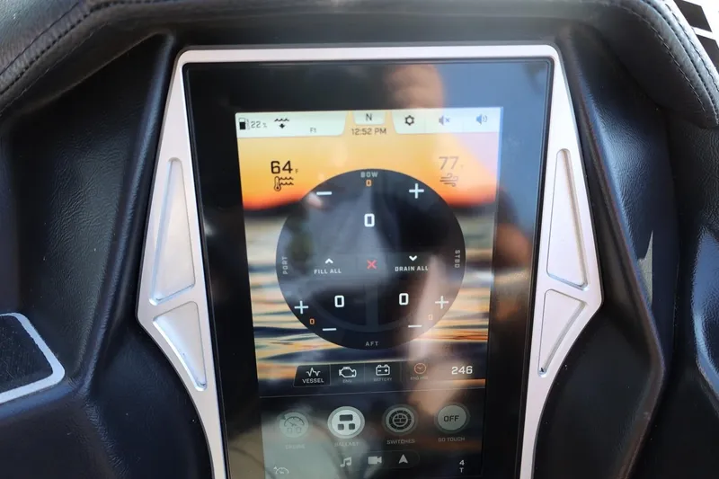Slide: The Image of 2021 Tigé 21ZX touchscreen dashboard displaying temperature and control settings. - 31