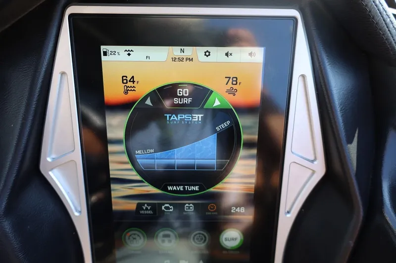 Slide: The Image of Touchscreen display of 2021 Tigé 21ZX boat showing TAP3 surf system settings. - 34