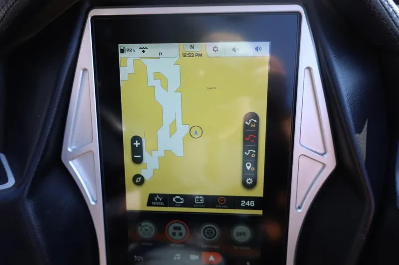 Slide: The Image of Touchscreen display in a 2021 Tigé 21ZX boat showing navigation map. - 35