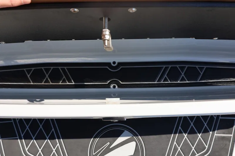 Slide: The Image of 2021 Tigé 21ZX boat detail showing deck design and hardware components. - 53