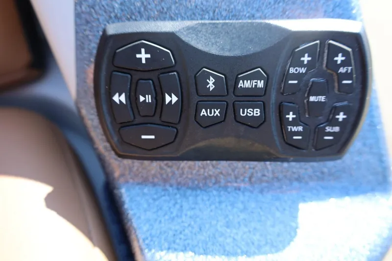 Slide: The Image of Control panel of a 2021 Tigé 21ZX boat with audio and speaker settings. - 55
