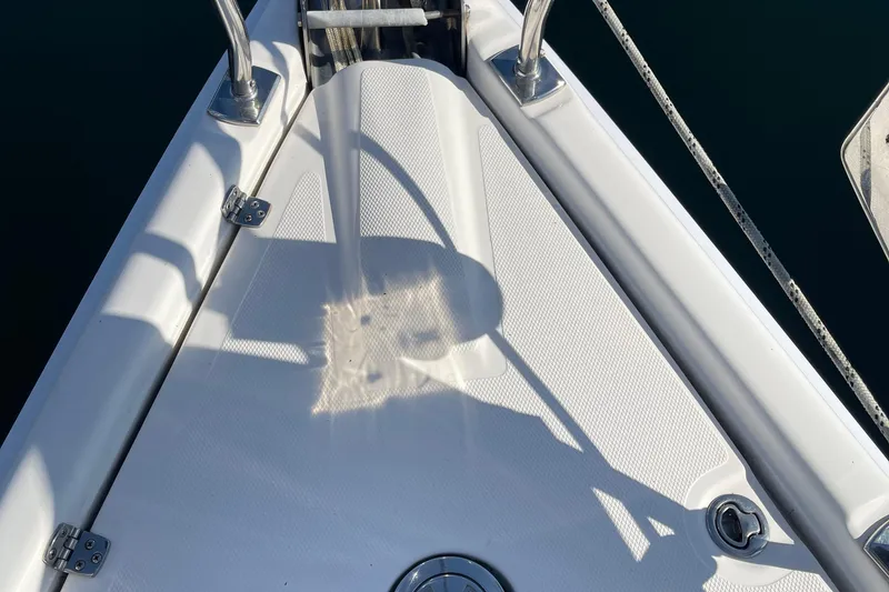 Slide: The Image of Deck of 2008 Hunter 49 sailboat with stainless steel fittings and textured surface. - 29