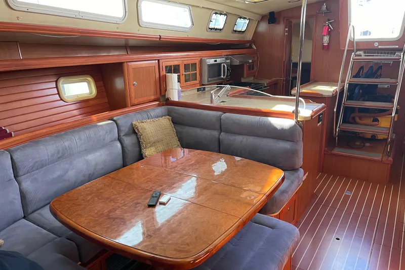 Slide: The Image of Luxurious interior of 2008 Hunter 49 yacht with dining area and kitchen. - 44