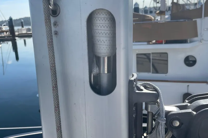 Slide: The Image of Close-up of a 2008 Hunter 49 sailboat mast with rigging details. - 61