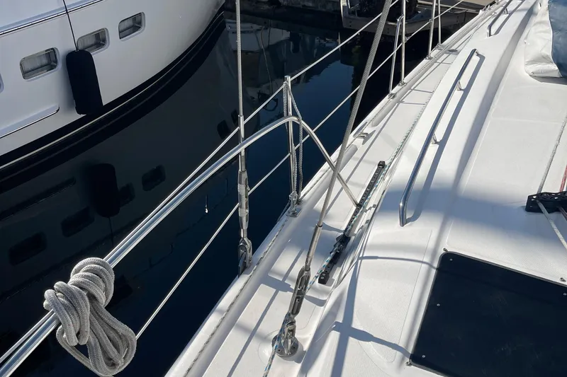 Slide: The Image of Deck of a 2008 Hunter 49 sailboat with stainless steel railings. - 62