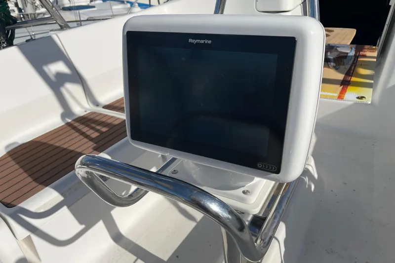 Slide: The Image of Raymarine navigation display on 2008 Hunter 49 yacht, featuring sleek design and modern technology. - 68