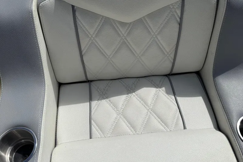 Slide: The Image of Luxurious quilted seat detail in a 2005 Marlago 35 boat interior. - 29
