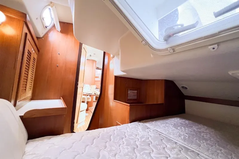 Slide: The Image of Aft berth featuring cozy cabin, large hatch for ventilation and natural lighting - 23
