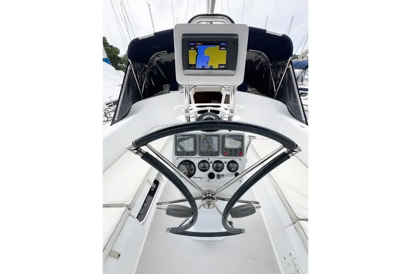 Slide: The Image of Navigation instruments and folding wheel. - 25