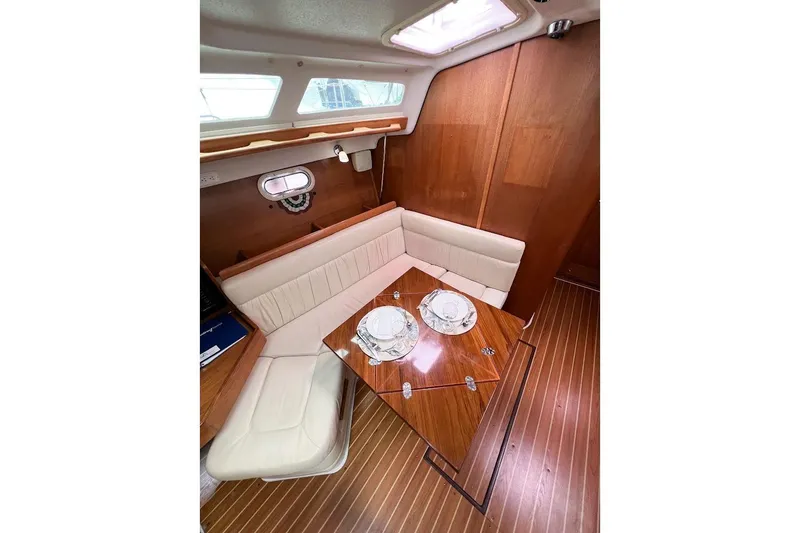 Slide: The Image of Close up port side of dining area and wooden finishes. - 7