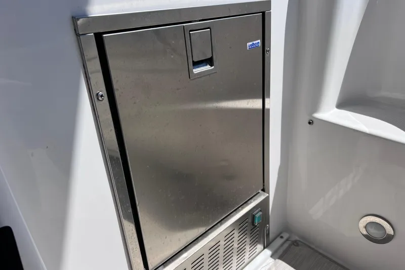 Slide: The Image of Stainless steel appliance on 2017 Everglades 360LXC boat interior. - 32