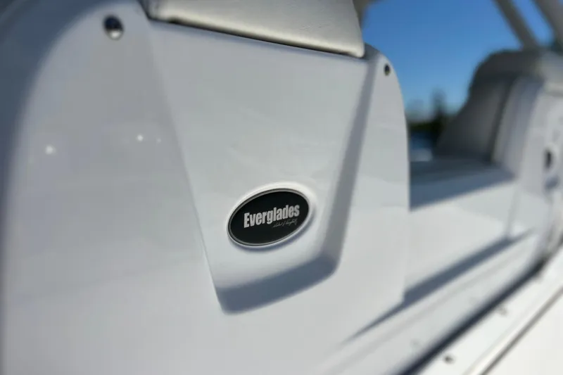 Slide: The Image of Close-up of 2017 Everglades 360LXC boat logo on white surface. - 36