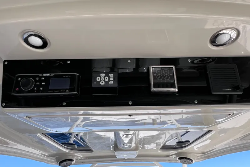 Slide: The Image of Control panel of 2017 Everglades 360LXC boat featuring Fusion and Garmin equipment. - 45