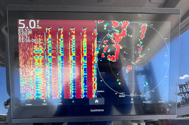 Slide: The Image of Garmin marine display showing sonar and radar data on Everglades 360LXC, 2017 model. - 48