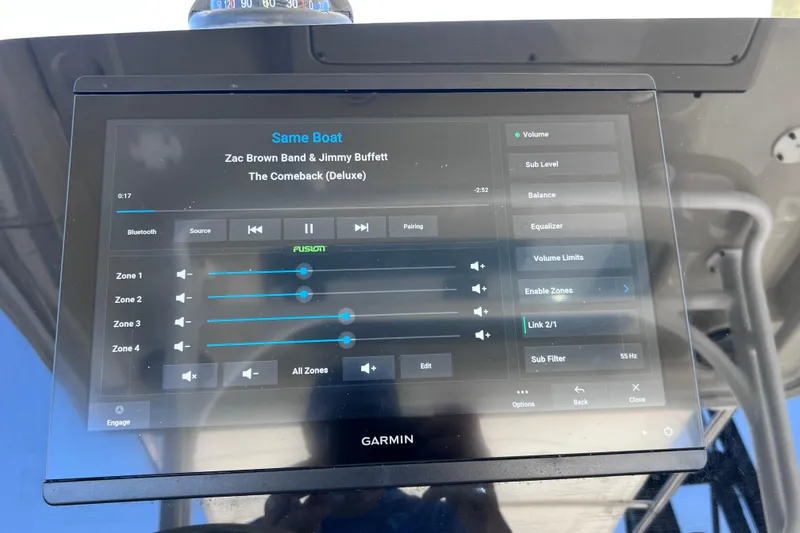 Slide: The Image of Touchscreen audio control panel on a 2017 Everglades 360LXC boat, displaying music settings. - 52