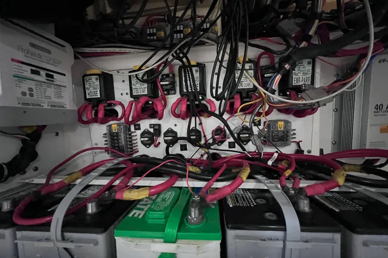 Slide: The Image of Electrical wiring and battery setup in a 2017 Everglades 360LXC boat. - 89