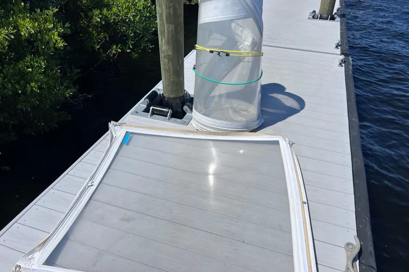 Slide: The Image of Clear boat enclosure panels on dock, Everglades 360LXC, 2017 model. - 95