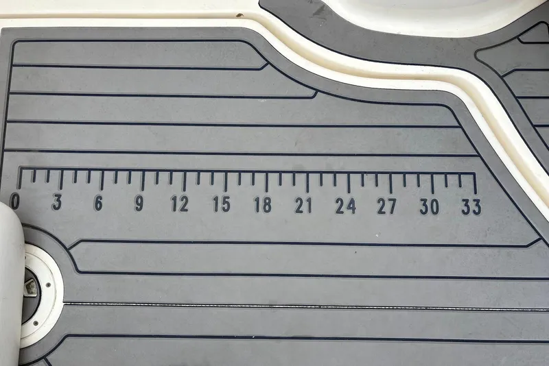 Slide: The Image of Deck of 2007 Sea Ray 340 Sundancer with integrated ruler for measurement. - 9