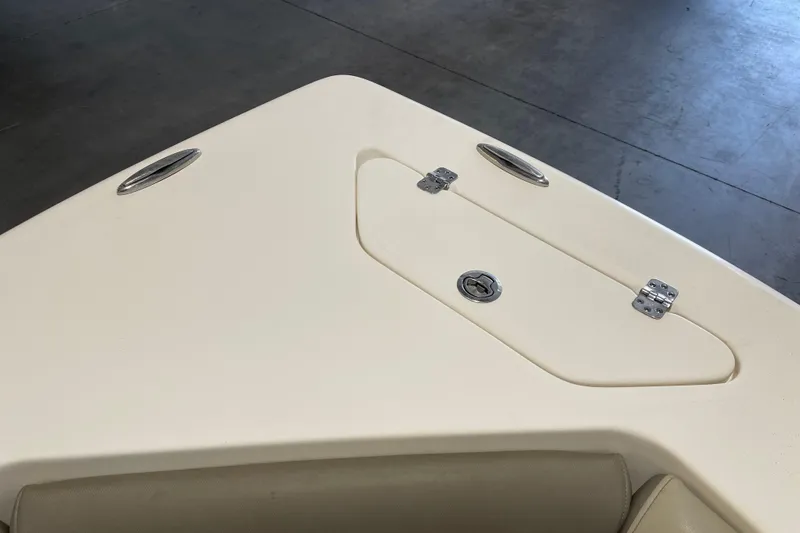 Slide: The Image of Bow of 2021 Key West 239 DFS boat with storage compartment and cleats. - 17