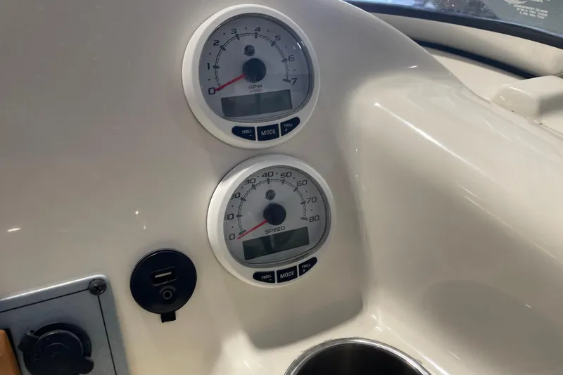Slide: The Image of Dashboard of 2021 Key West 239 DFS boat with RPM and speed gauges. - 23
