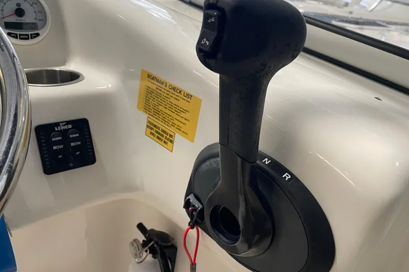 Slide: The Image of Close-up of 2021 Key West 239 DFS boat throttle and control panel. - 25