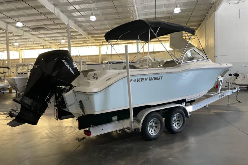 Slide: The Image of 2021 Key West 239 DFS boat on trailer in indoor storage facility. - 3