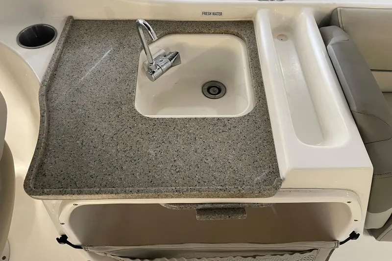 Slide: The Image of 2021 Key West 239 DFS boat sink with granite countertop and fresh water faucet. - 35