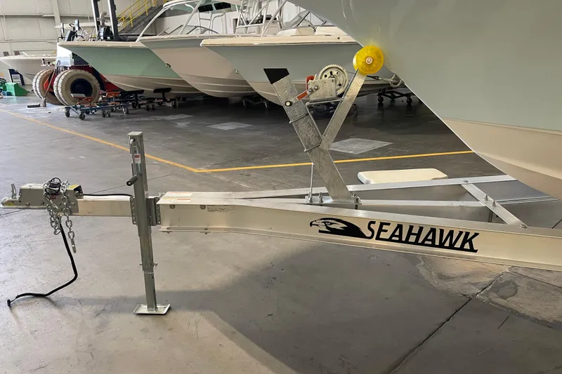 Slide: The Image of 2021 Key West 239 DFS boat on Seahawk trailer in indoor storage facility. - 39