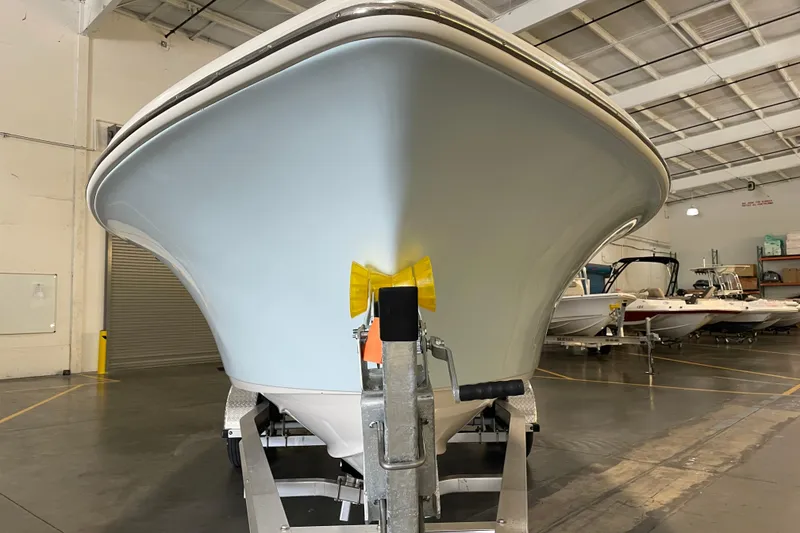 Slide: The Image of 2021 Key West 239 DFS boat on trailer in indoor storage facility. - 5