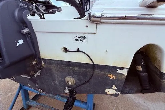 Slide: The Image of 2013 Sea Fox 226 Commander boat transom with "No Wood! No Rot!" sticker. - 14