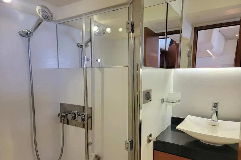 Slide: The Image of Luxurious bathroom in 2013 Prestige 500 S yacht with modern shower and sink. - 18
