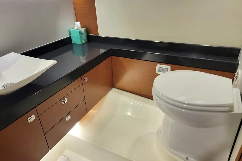 Slide: The Image of Luxurious bathroom in 2013 Prestige 500 S yacht with modern fixtures and sleek design. - 19