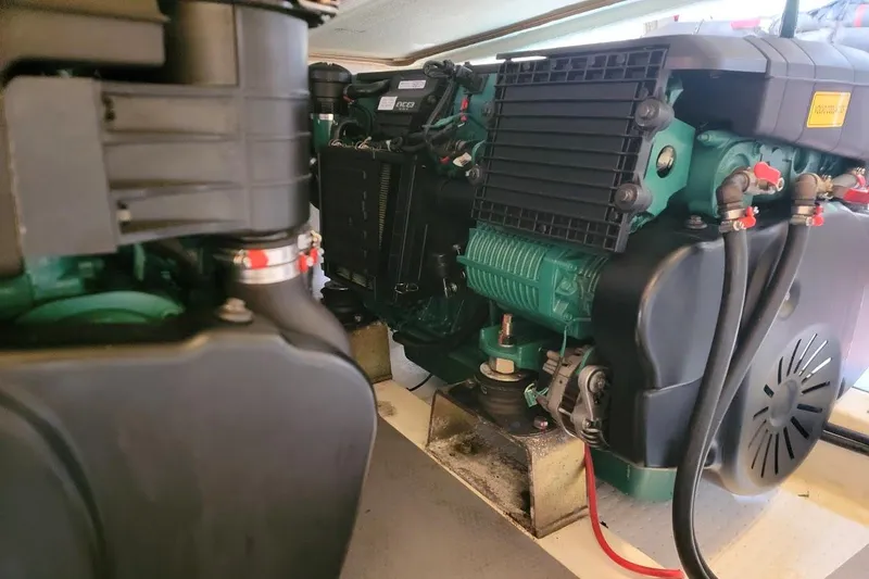 Slide: The Image of Engine compartment of a 2013 Prestige 500 S yacht, showcasing mechanical components. - 23