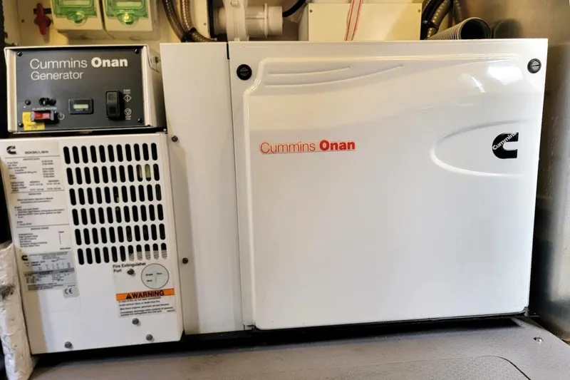 Slide: The Image of Cummins Onan generator in a 2013 Prestige 500 S yacht engine room. - 25