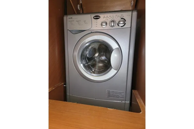 Slide: The Image of Front-loading washing machine, Prestige 500 S, 2013 model, in a wooden cabinet. - 37