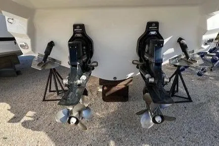 Slide: The Image of 2017 Monterey 328SS Super Sport boat with dual propellers on stands. - 22