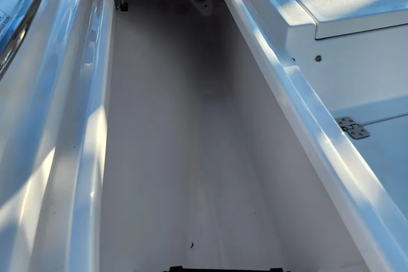 Slide: The Image of 2018 Sportsman Masters 247 Bay Boat interior storage compartment. - 21