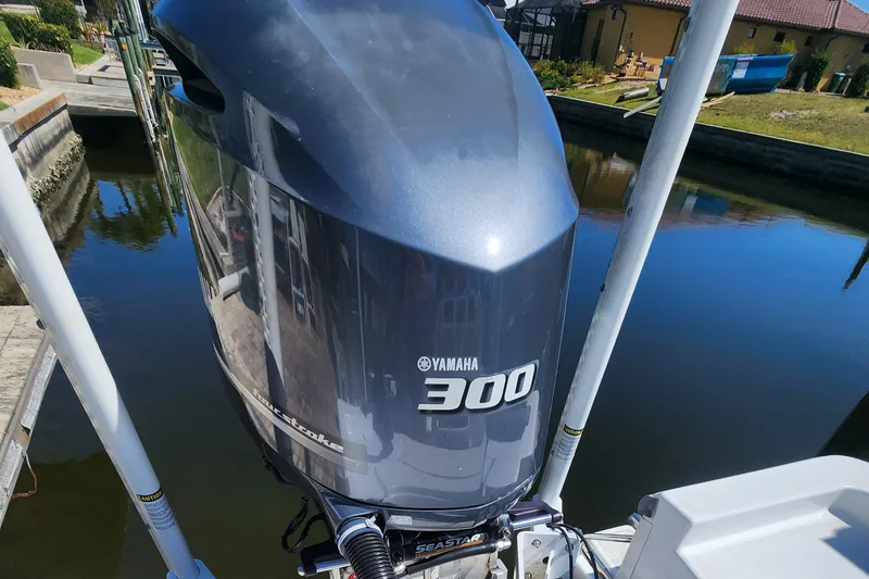 Slide: The Image of 2018 Sportsman Masters 247 Bay Boat with Yamaha 300 engine on calm water. - 3