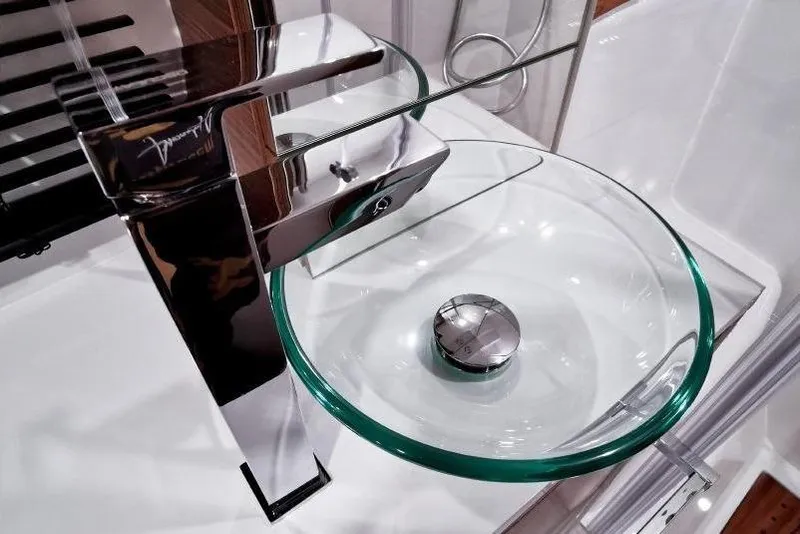 Slide: The Image of Modern glass sink with sleek chrome faucet on Cobrey 28 SC, 2026 model. - 11