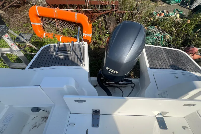 Slide: The Image of 2020 Jeanneau NC Sport 795 boat with Yamaha 200 engine and safety equipment. - 14