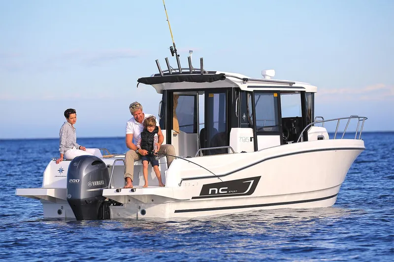 Slide: The Image of Manufacturer Provided Image: 2020 Jeanneau NC Sport 795 boat on water with people fishing. - 19
