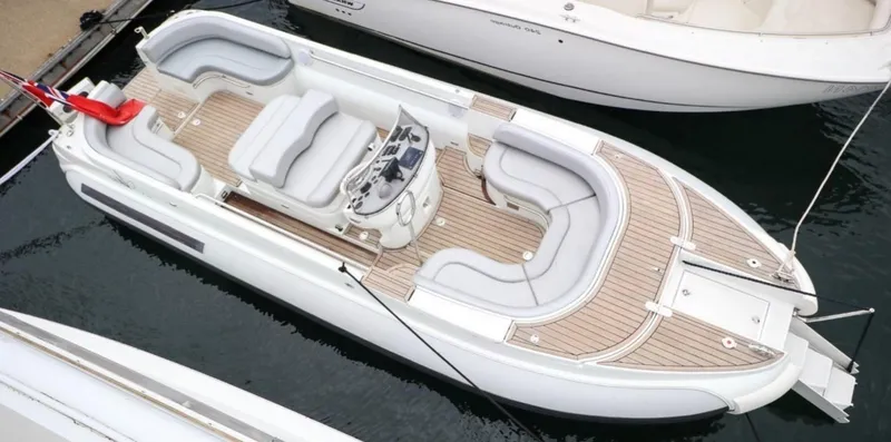 Slide: The Image of 2008 Castoldi Jet Tender 23 boat docked in marina. - 6