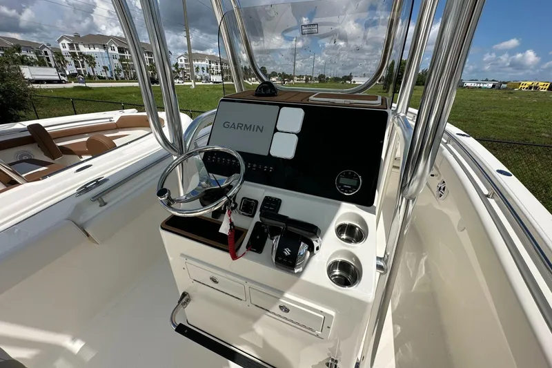 Slide: The Image of 2026 Bulls Bay 255 Center Console boat interior with Garmin navigation system. - 8