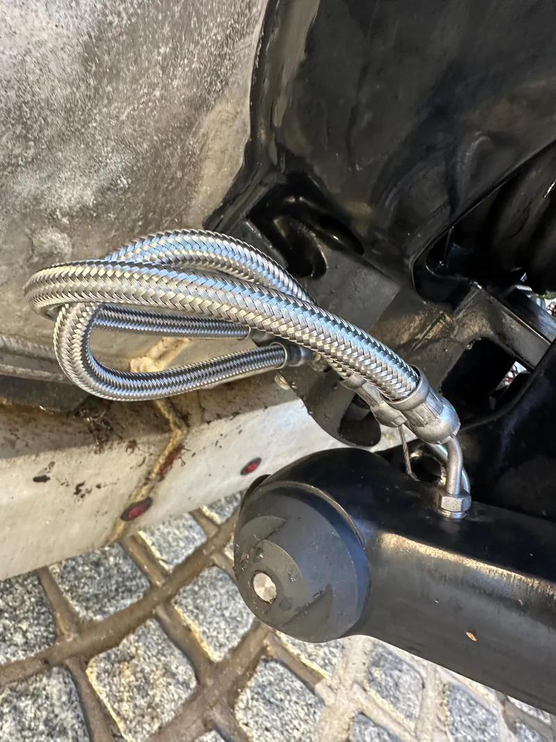 Slide: The Image of Close-up of Zodiac 24 (2008) engine part with braided metal hose. - 15