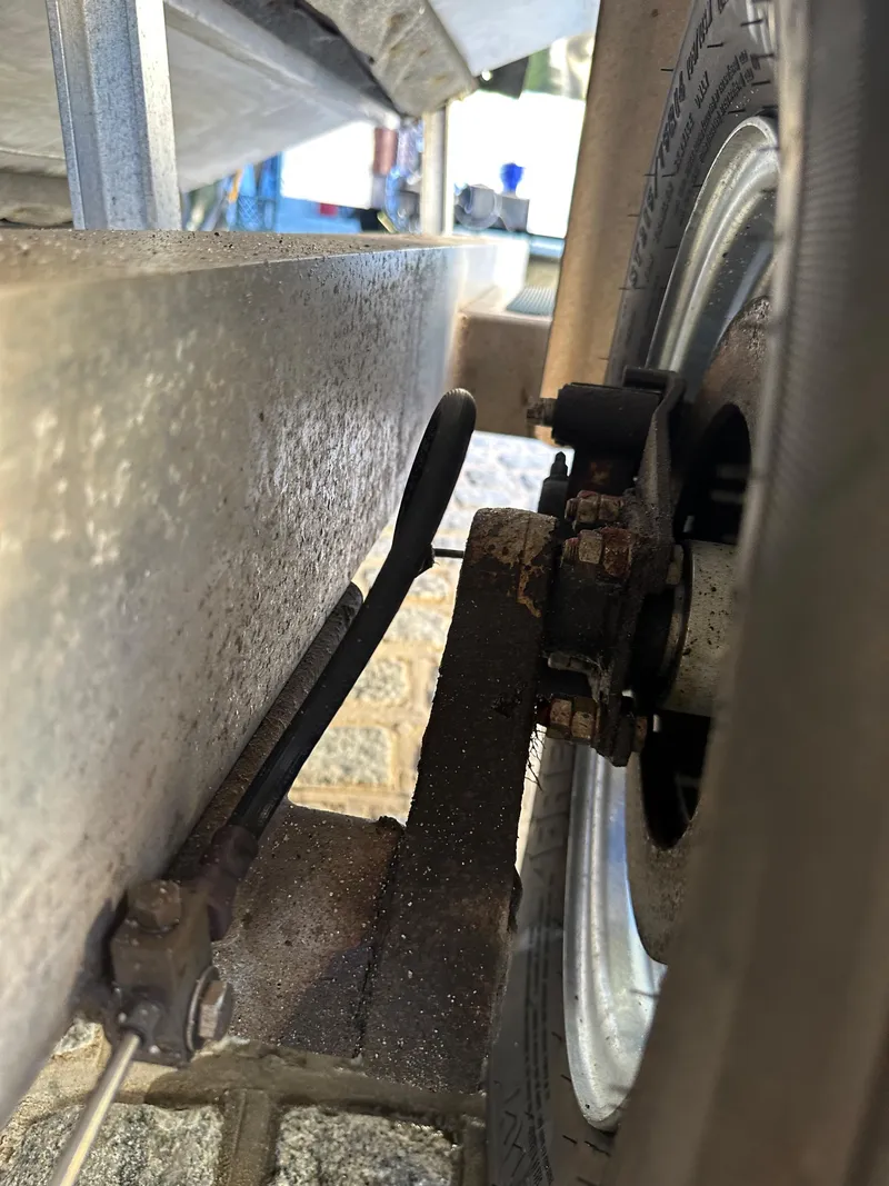 Slide: The Image of Close-up of Zodiac 24 trailer wheel and suspension system, 2008 model. - 18