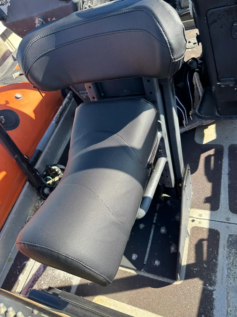 Slide: The Image of Captain's seat of a 2008 Zodiac 24 boat. - 7