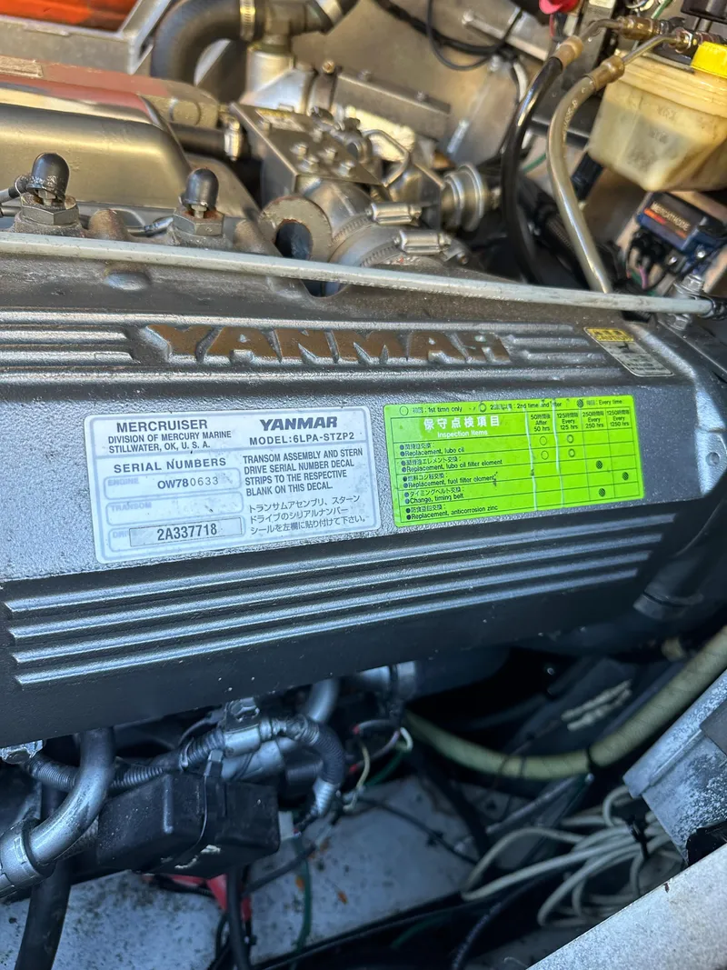 Slide: The Image of Close-up of a Yanmar engine in a 2008 Zodiac 24 boat. - 9