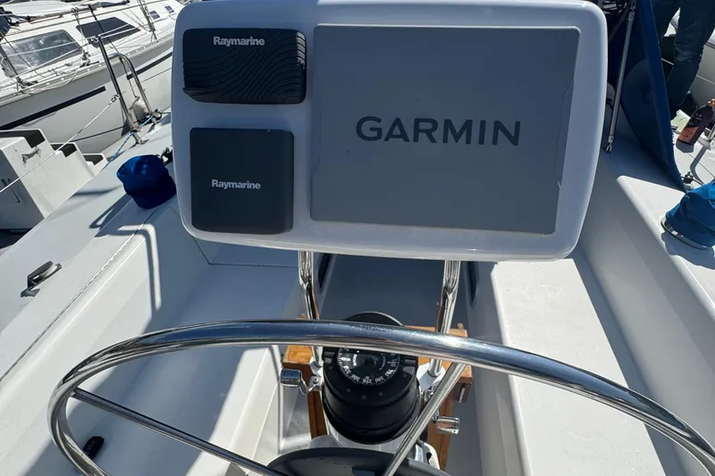 Slide: The Image of Steering wheel and navigation equipment on a 1994 Catalina 320 sailboat. - 14